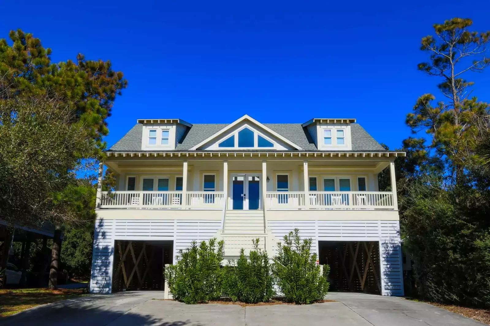 Guests may park in both sides of the carport, on the front driveway or on the driveway behind the house.