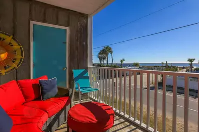 Relax on the outdoor sofa and enjoy the sound of the waves as the sun rises each morning!