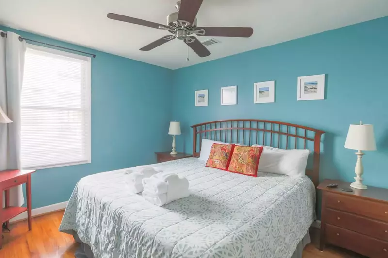 The king bed in the bedroom has a new, cool gel memory foam mattress.