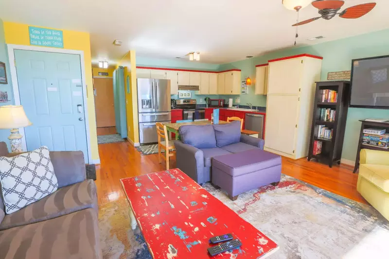 The open floor plan layout makes it very easy to interact with guests in the kitchen & living room areas.