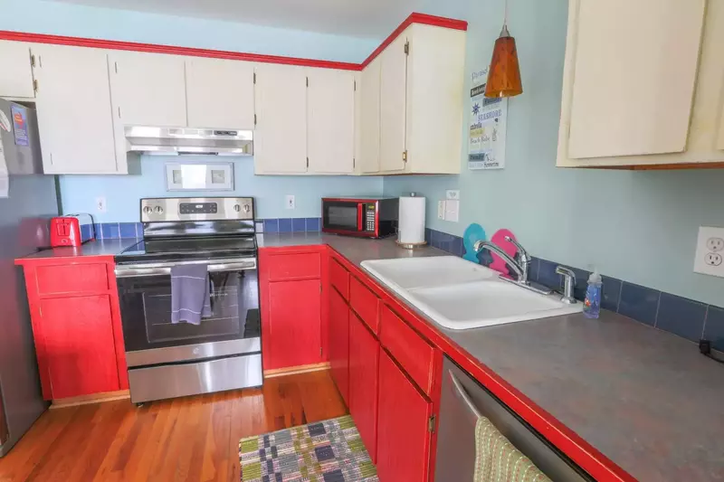 There's plenty of counter space and cabinet storage area for your food & kitchen items.