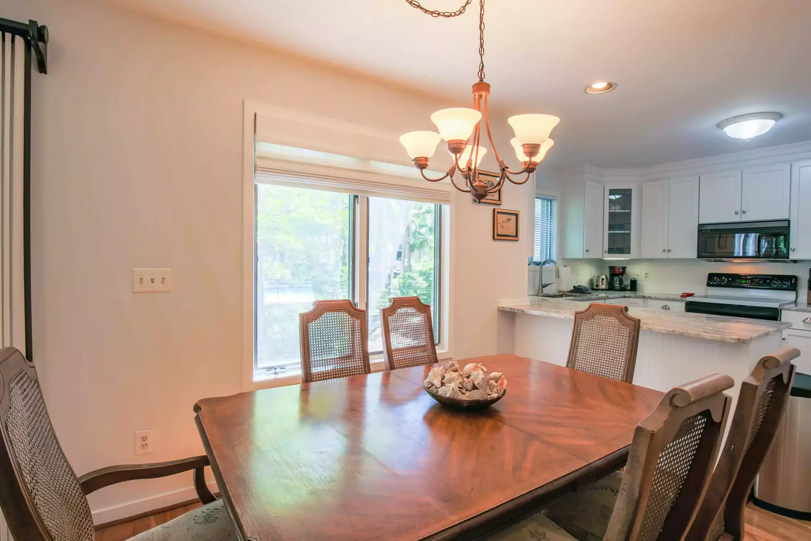 The dining room table can seat up to 6 people.
