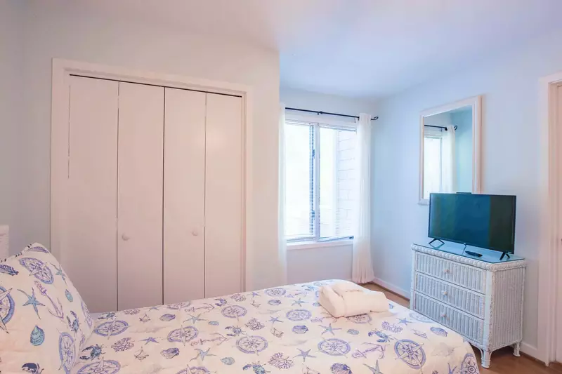 The guest bedroom also has its own smart TV.