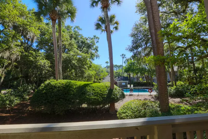 You can view the community pool from the partially covered deck.