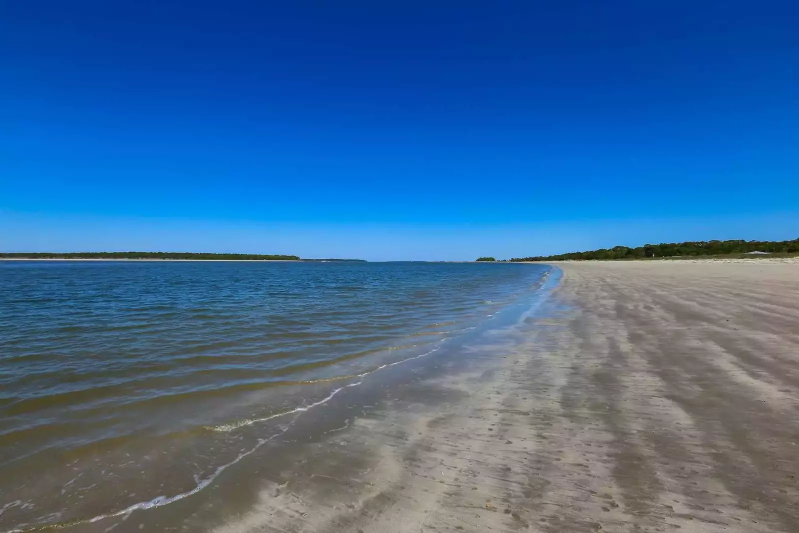 The long shallow beach is perfect for kids (of all ages!)