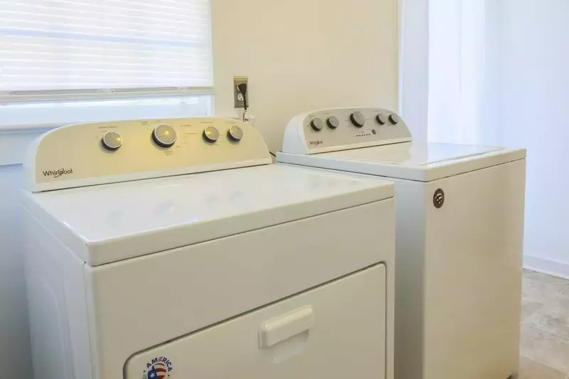 There's a full sized washing machine & dryer in the home.