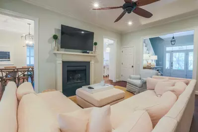 The Green Winged Teal living room connects to the foyer, dining room and kitchen.
