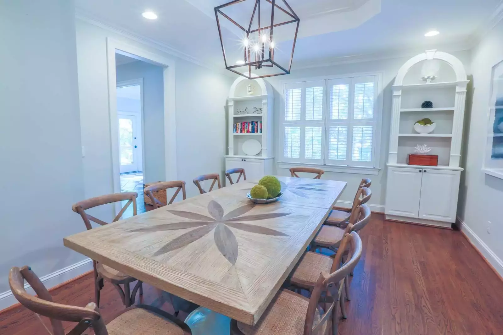 The dining room is centrally located between the kitchen, living room and butler's pantry.