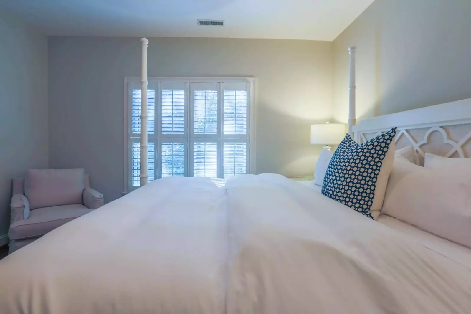 This guest bedroom looks out over the front side of the home.