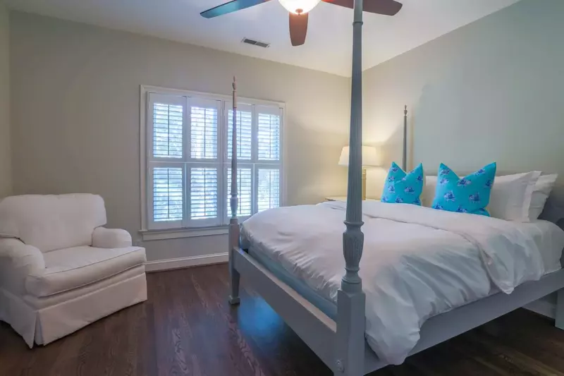 This guest bedroom off of the media room on the second floor has a queen bed.