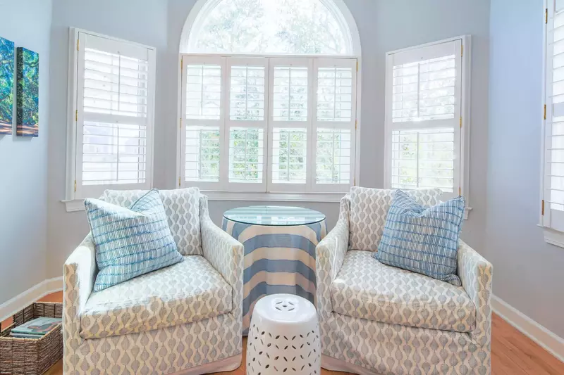 The living room, kitchen and dining room receive terrific natural light.