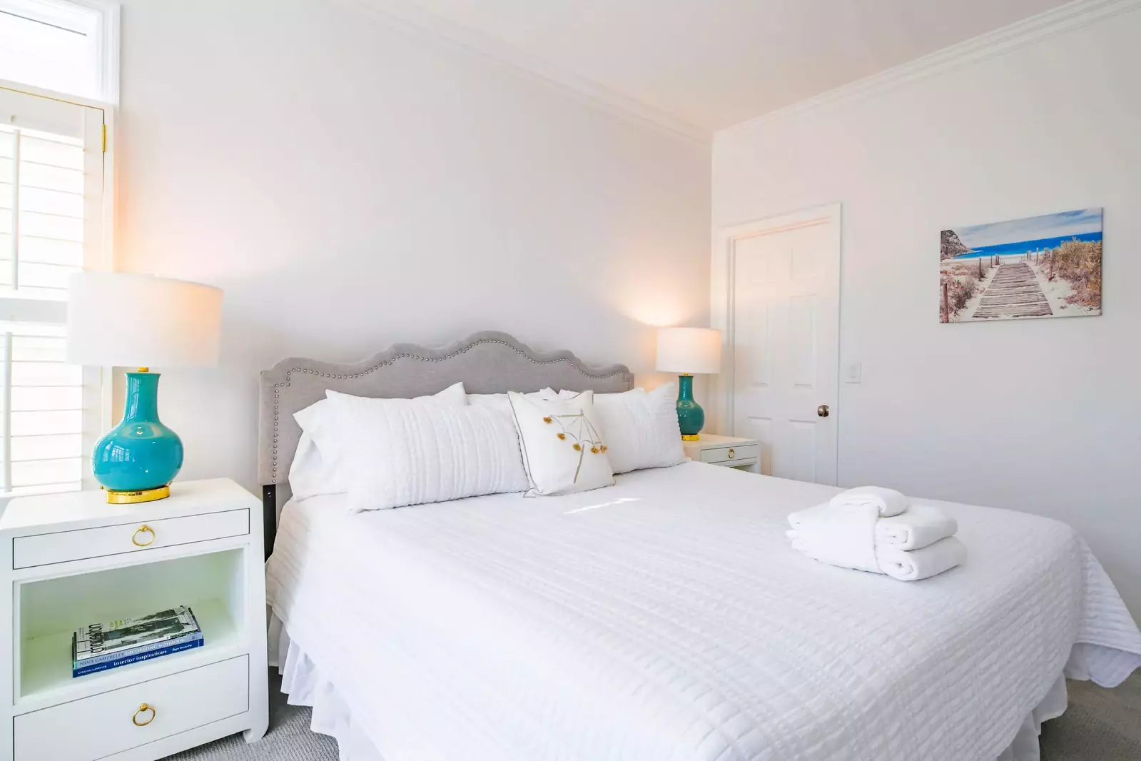 All three bedrooms on the home's main level have freshly painted walls and new carpets.