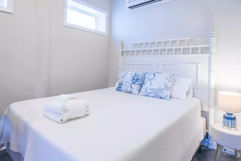 There is also a queen bed on the ground floor near the bunk beds.