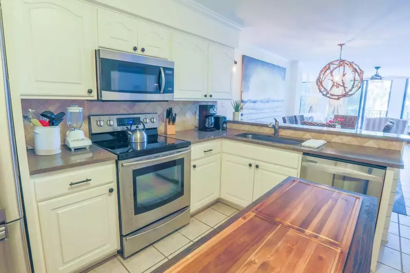 There's plenty of room in the kitchen for you and your guests to prepare your meals.
