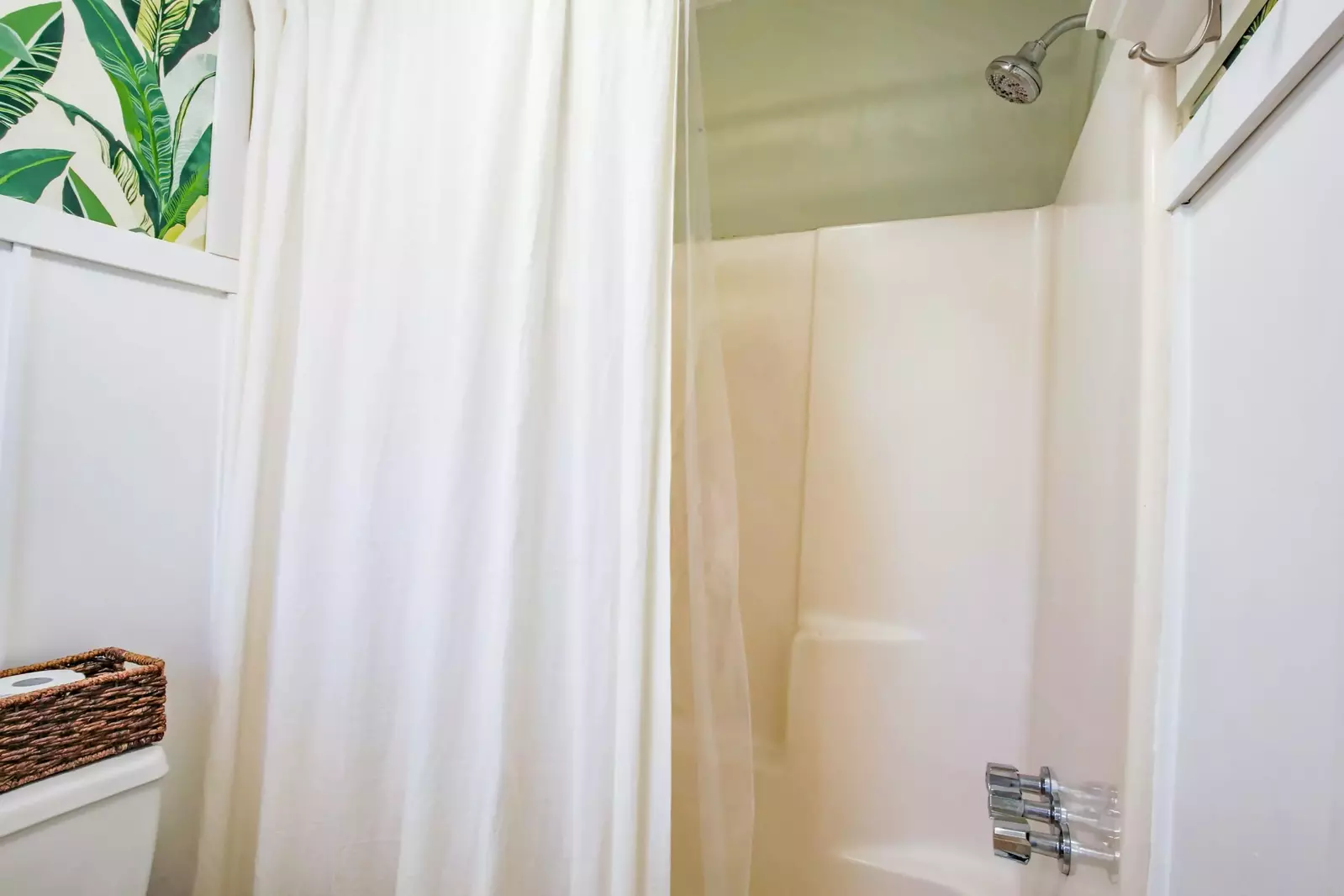 The master bathroom also has a shower/tub combo.