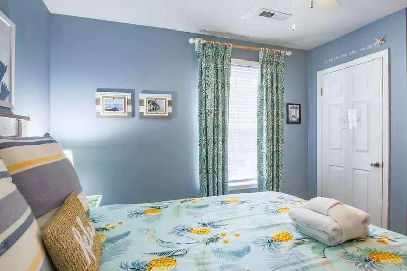 This guest bedroom also receives lovely natural light.