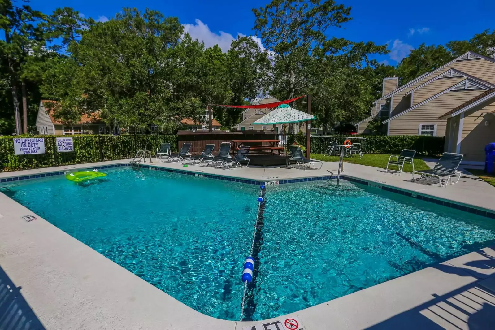 Herons' Haven is located right next door to the Planters Place community pool.