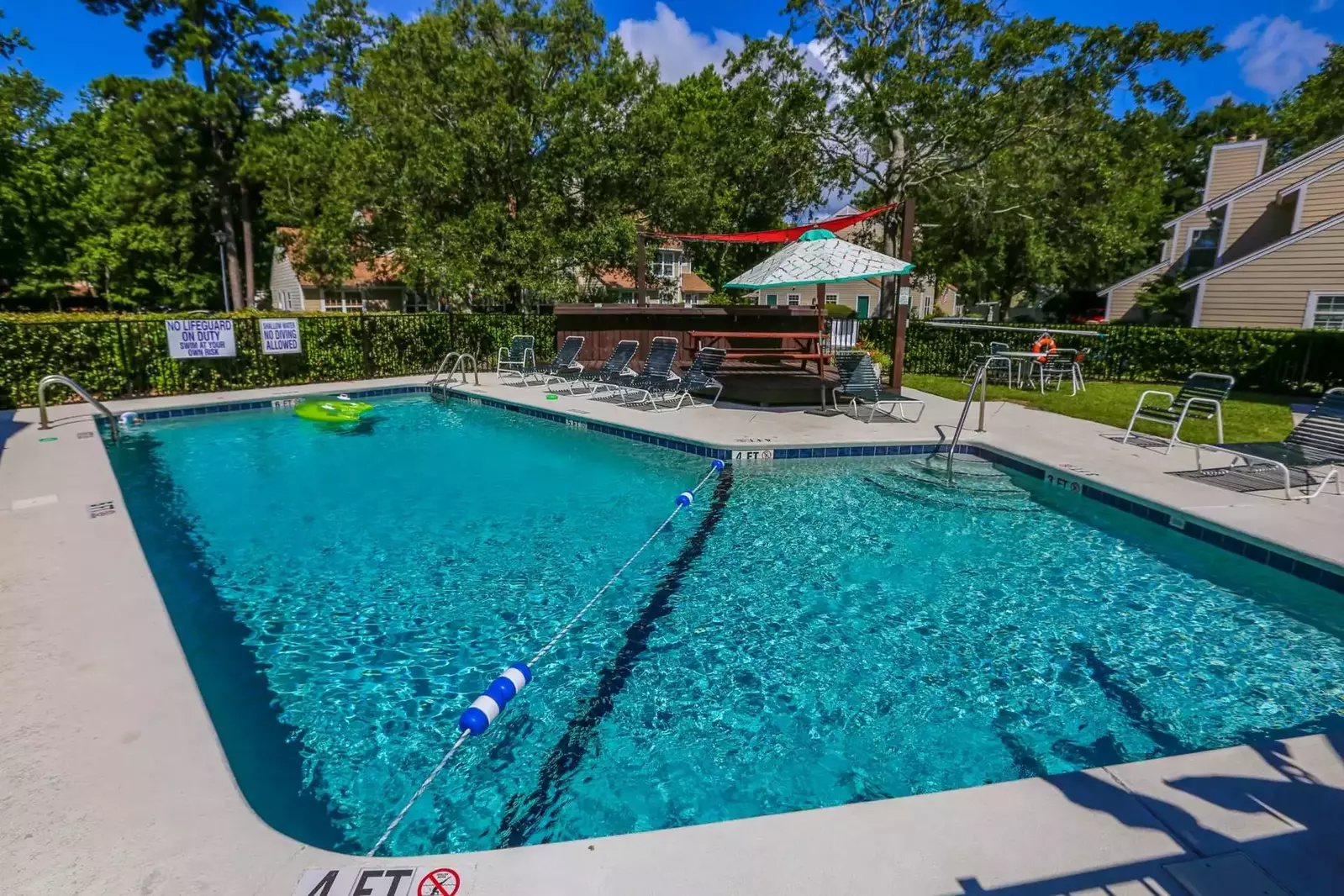 There are lounge chairs, a picnic table and bathrooms available for your use in the pool area.