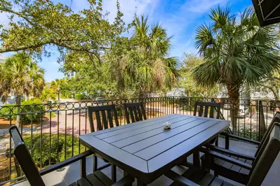 Dine al fresco on the balcony off of the living room and dining room.