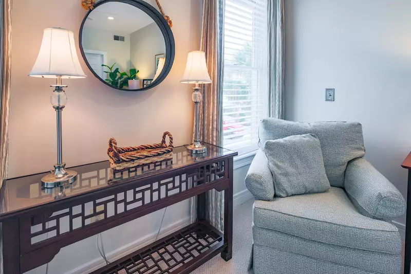 There's a comfortable arm chair in the corner of the lower level master suite.