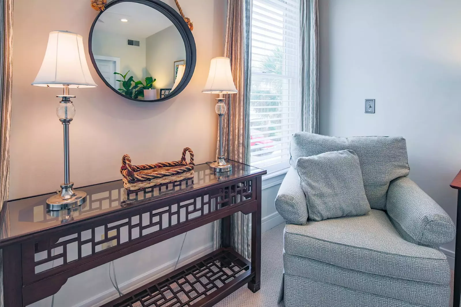 There's a comfortable arm chair in the corner of the lower level master suite.