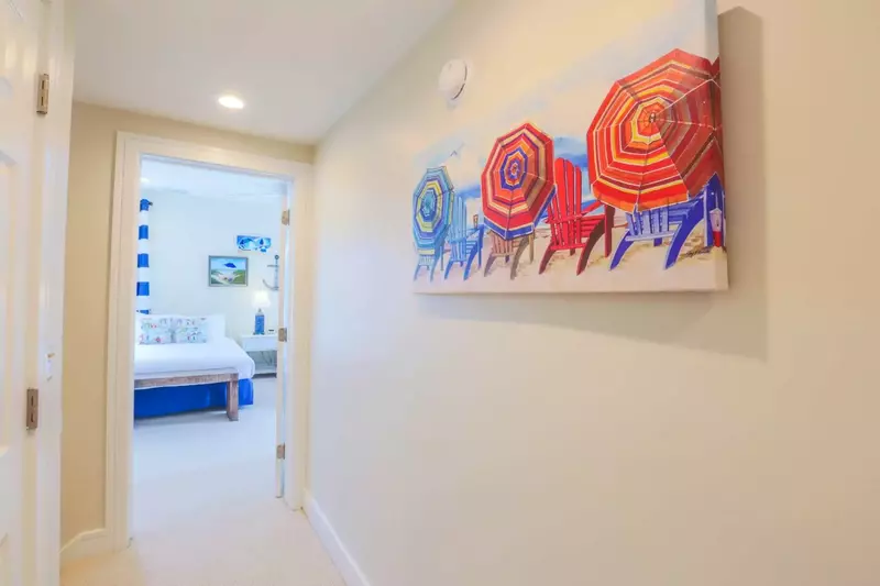 This central hallway separates the two guest bedrooms located on the second floor.