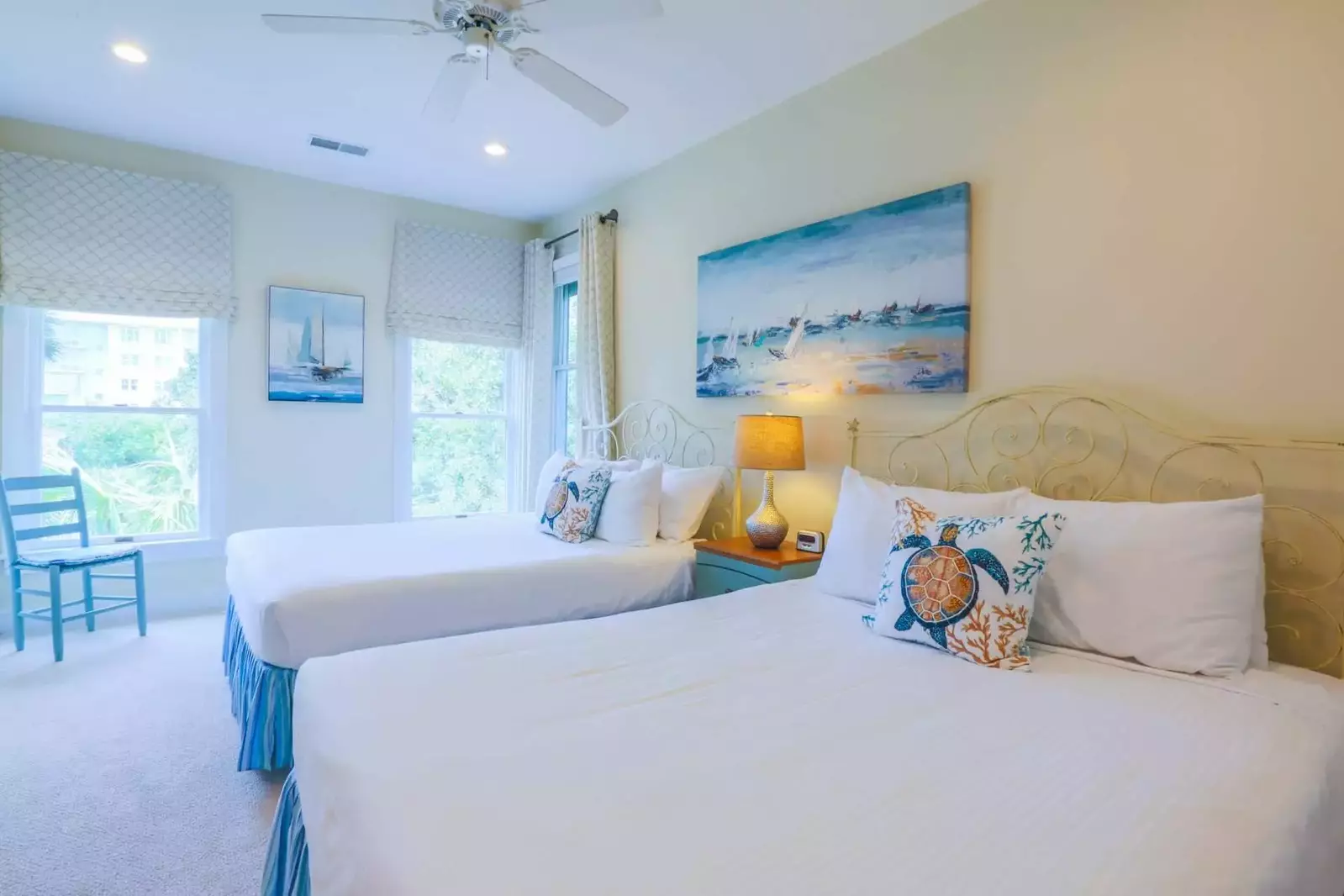 The second queen suite on the second floor also features two queen beds.