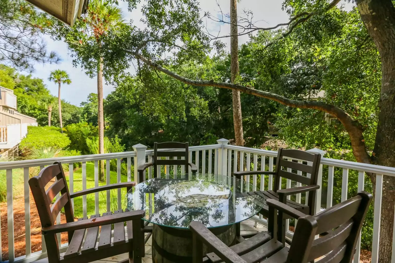This high top outdoor table comfortably seats 4 people.
