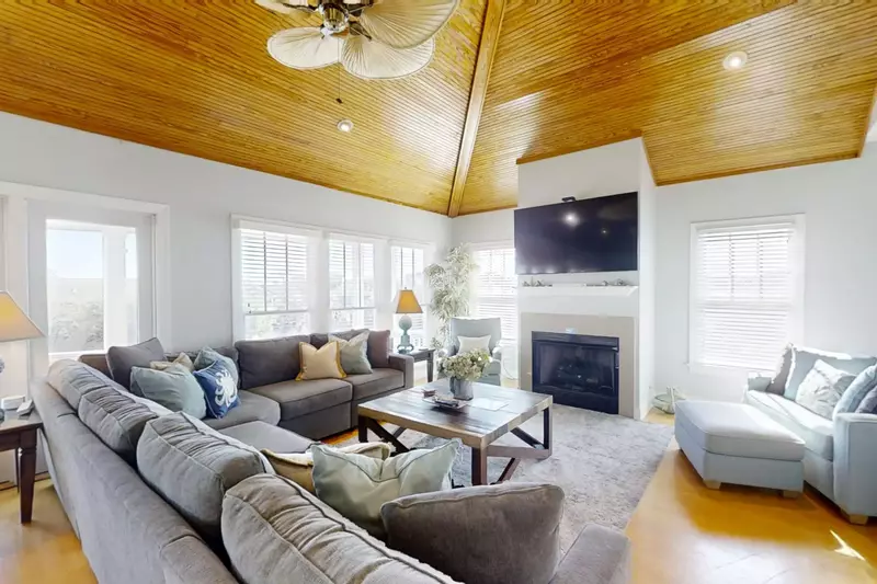 There's plenty of seating for your whole family in the home's living room.