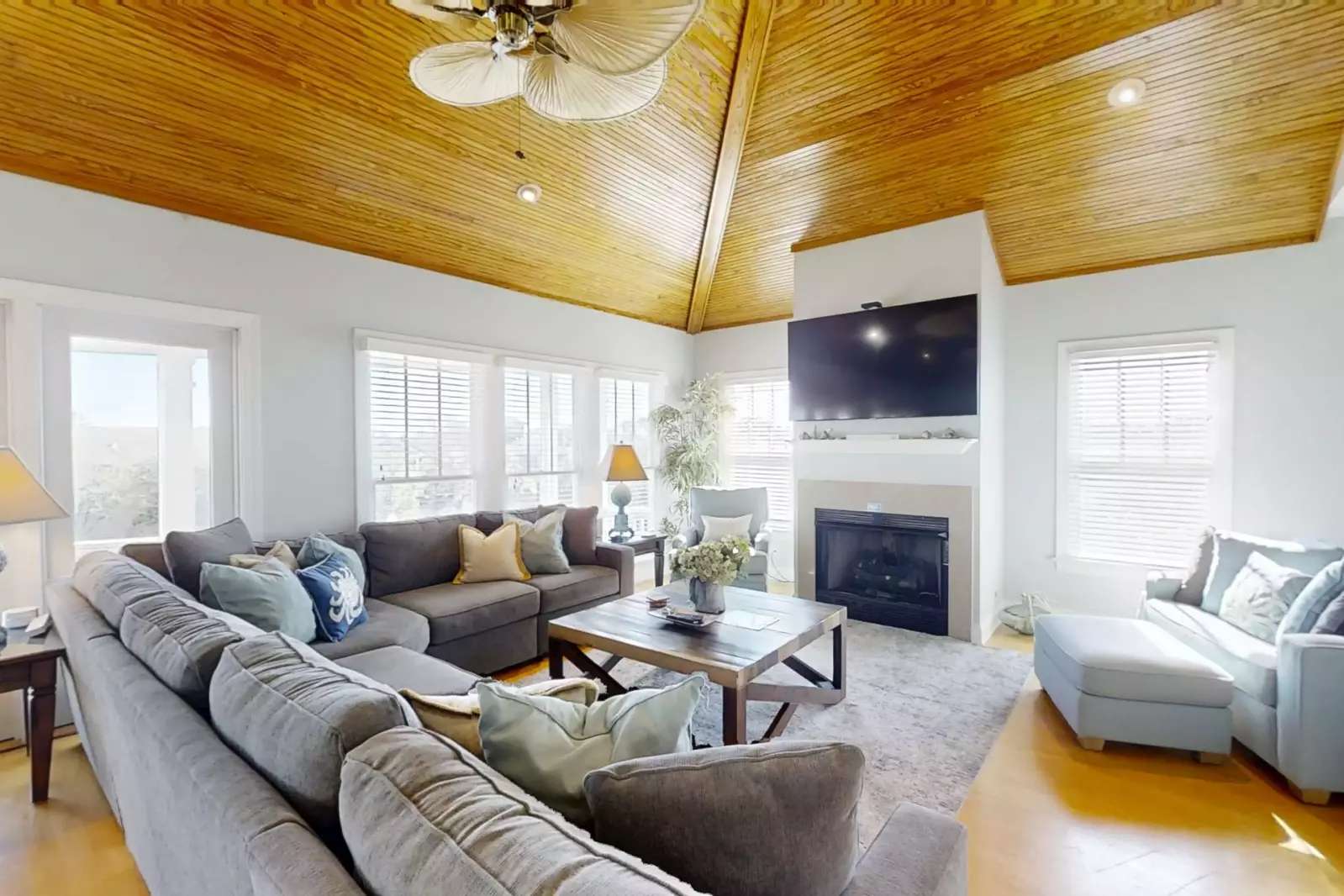 There's plenty of seating for your whole family in the home's living room.