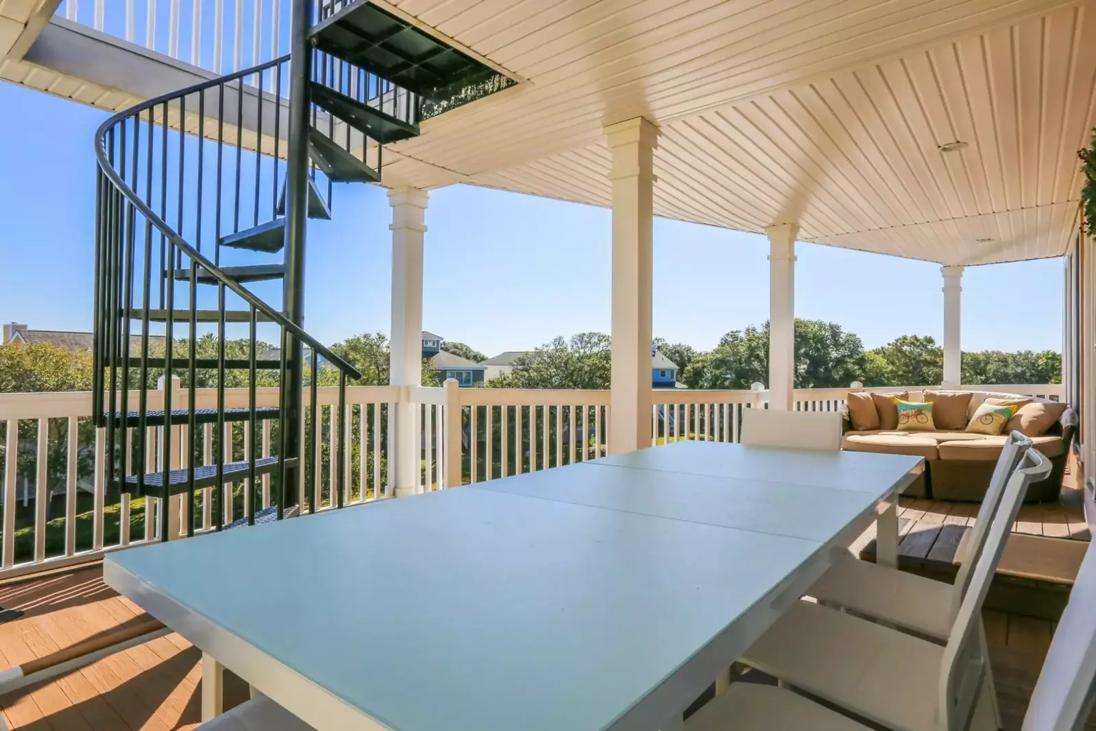 The outdoor dining table seats 8 people.