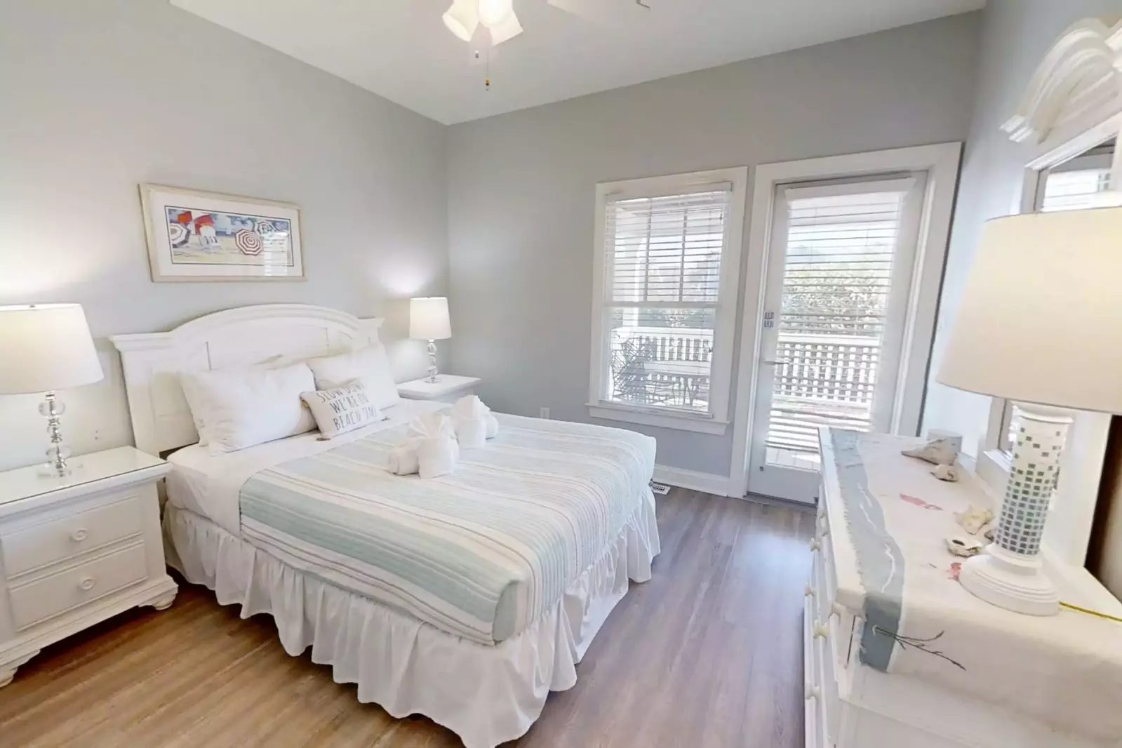 This guest suite with a queen bed is located on the home's first level.