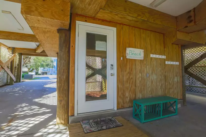 You'll find the front door to Going Coastal in the carport.