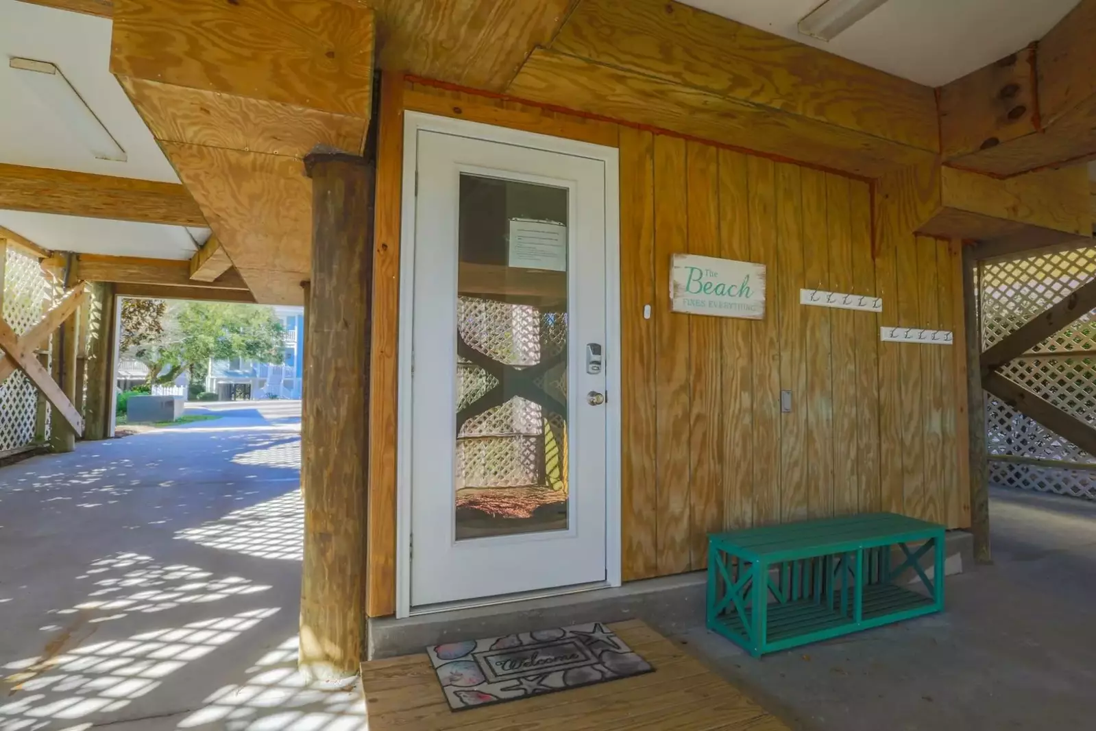 You'll find the front door to Going Coastal in the carport.