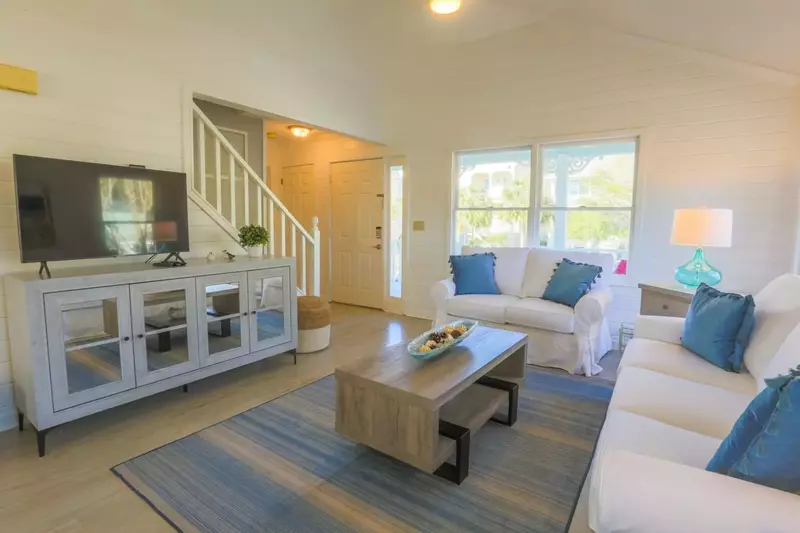 When you enter the front door, you'll find this living room with cable TV and the stairwell to the second floor.