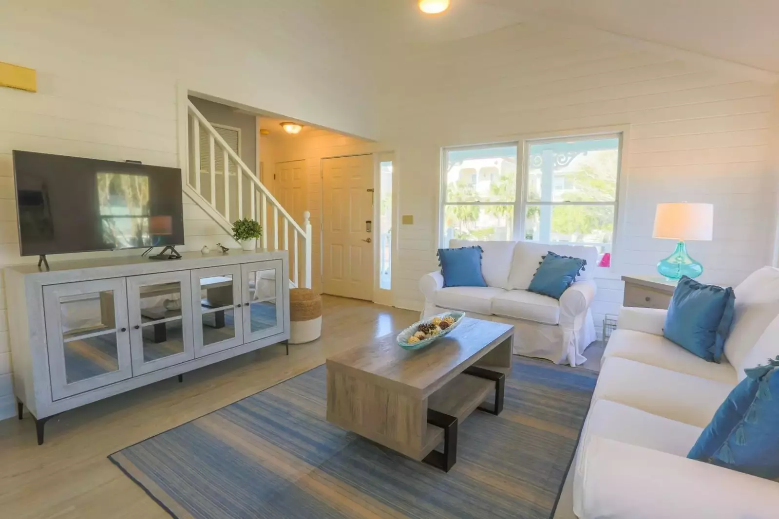 When you enter the front door, you'll find this living room with cable TV and the stairwell to the second floor.