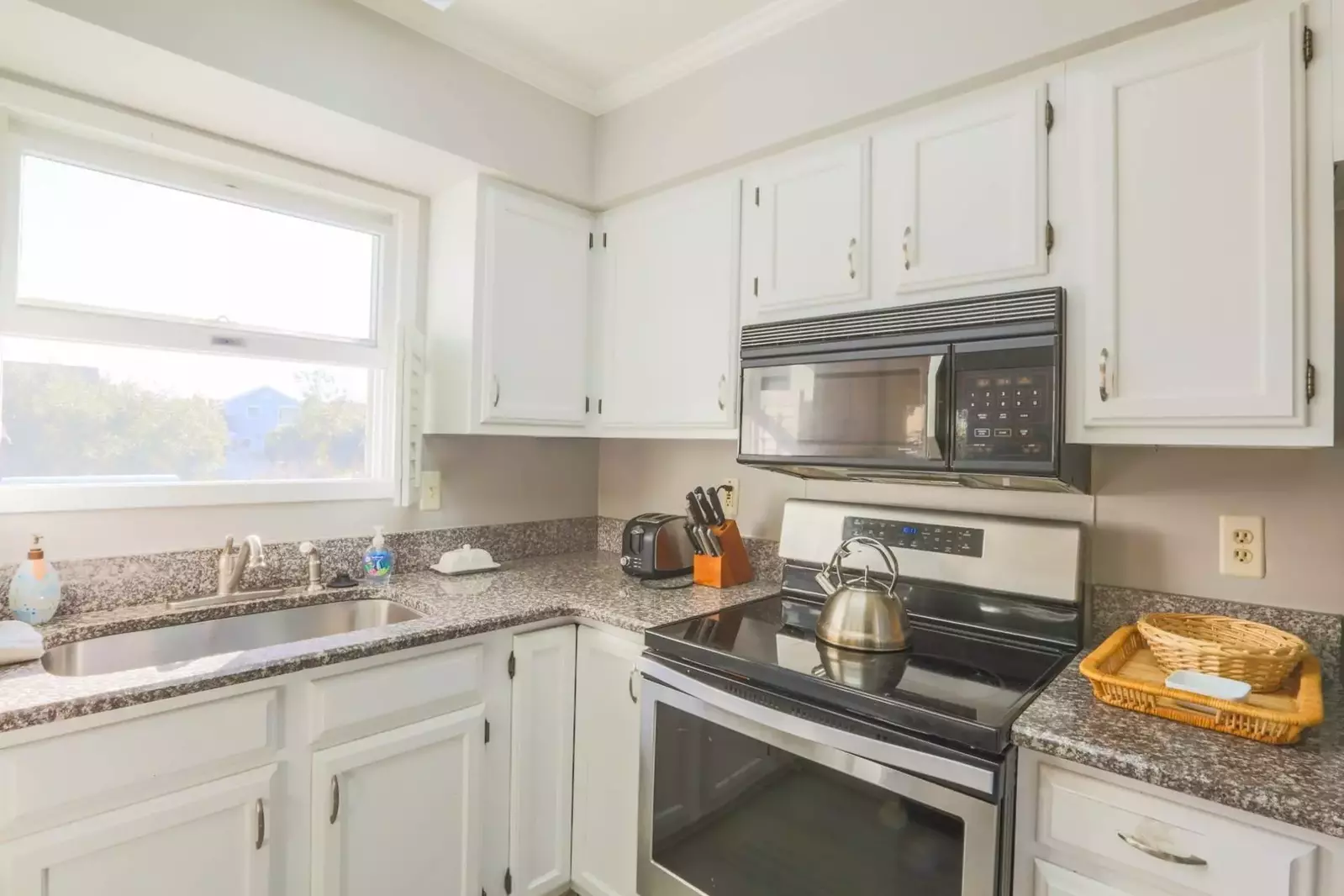 There's plenty of room in the kitchen for you and your guests to prepare your meals.