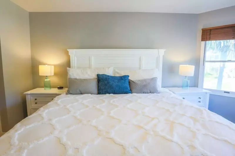 There are also night stands with reading lamp on both sides of the king bed.
