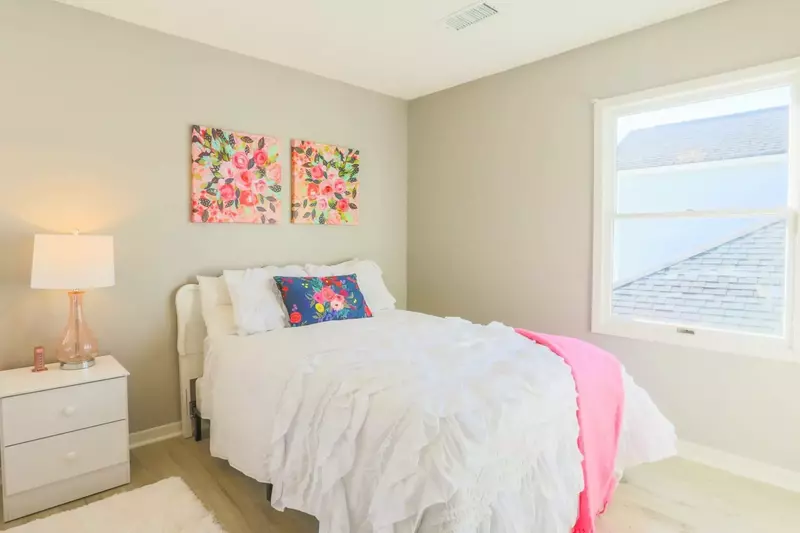 This bedroom receives terrific natural sunlight.