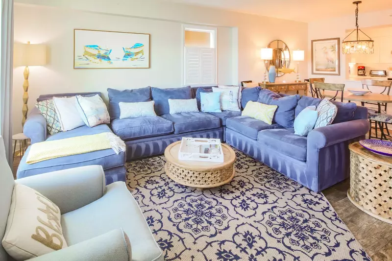 The condo is decorated with a fun mix of coastal blues, yellows, browns and golds.