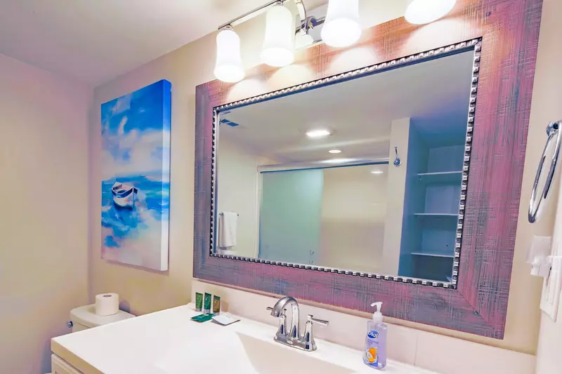 The en suite bathroom for the master suite has a spacious vanity.
