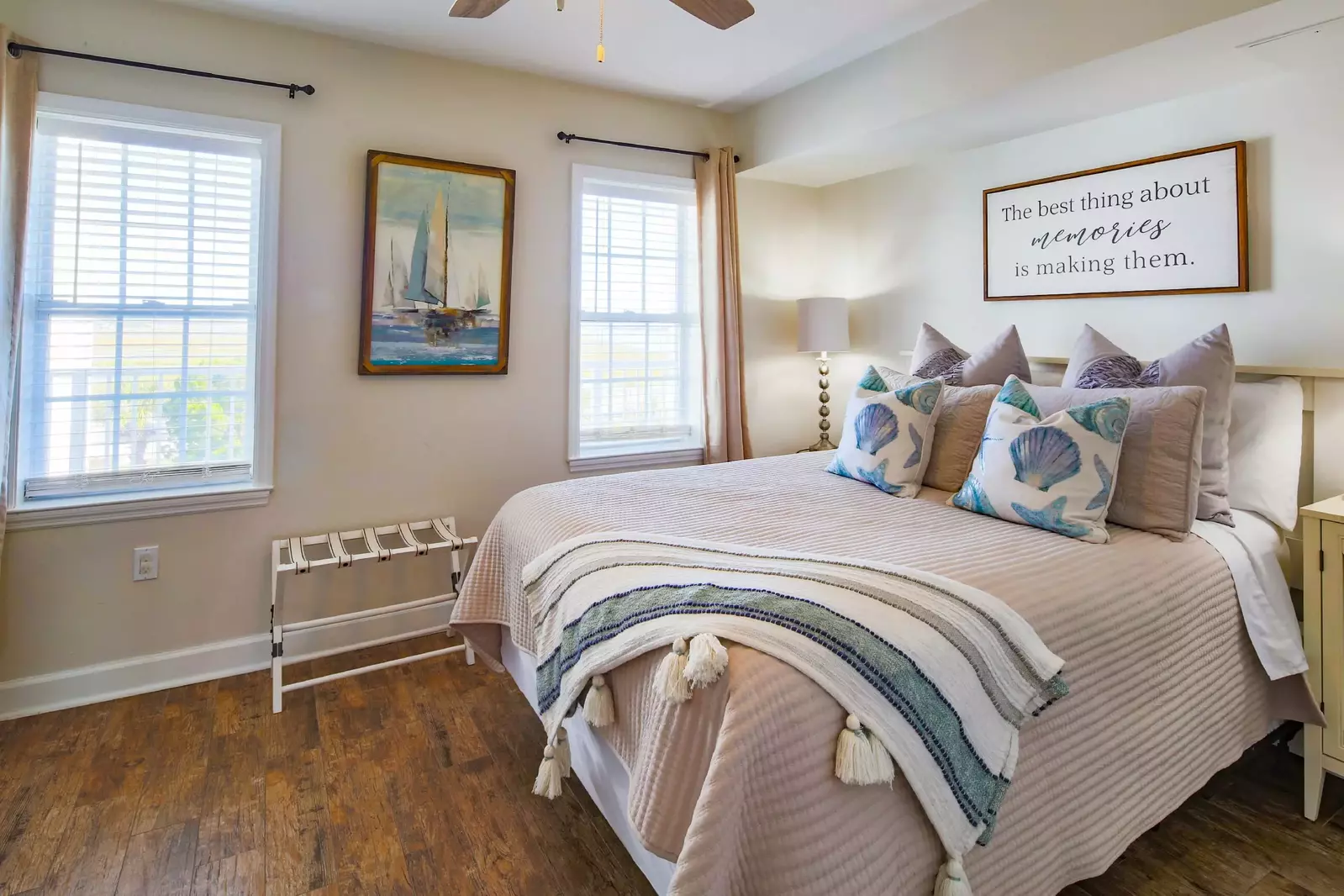 This guest bedroom has a queen bed, night stands and reading lamps.