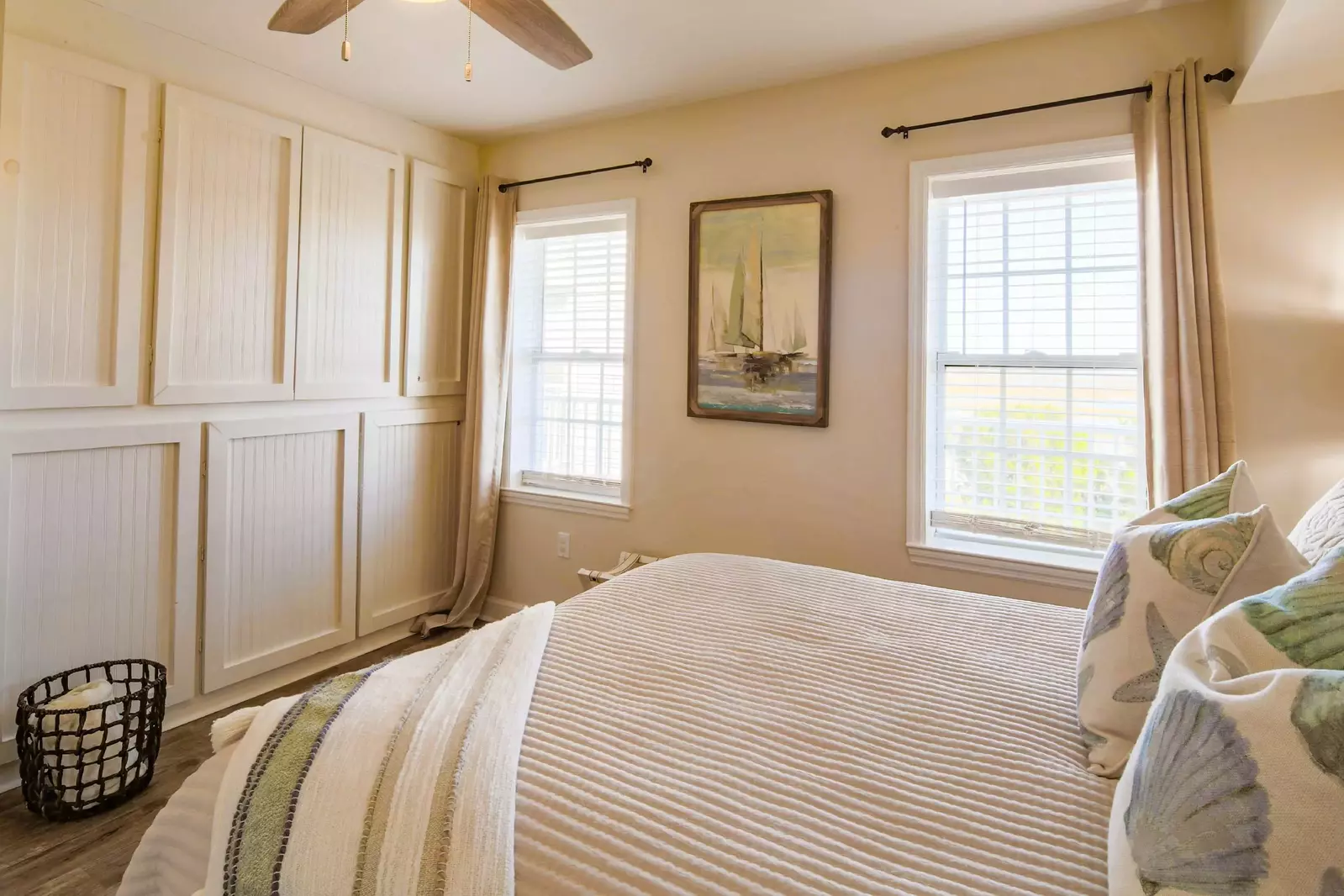 Guests of this bedroom will enjoy the views of the marsh.