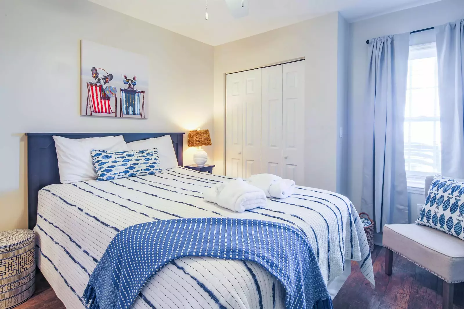 This guest bedroom is located off the hallway near the front door of the condo.