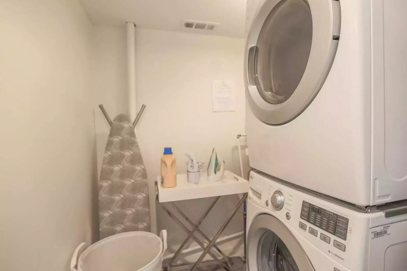 There is a laundry room with full sized washing machine and dryer in the condo.