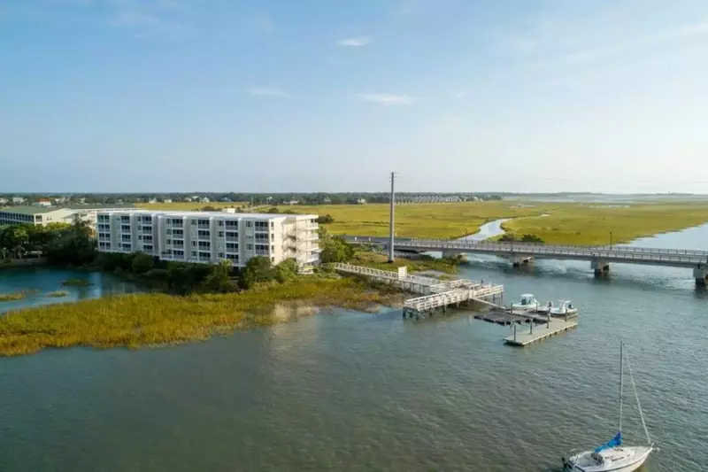 The front of the Turn of River building looks out onto this marsh alongside the Folly River.