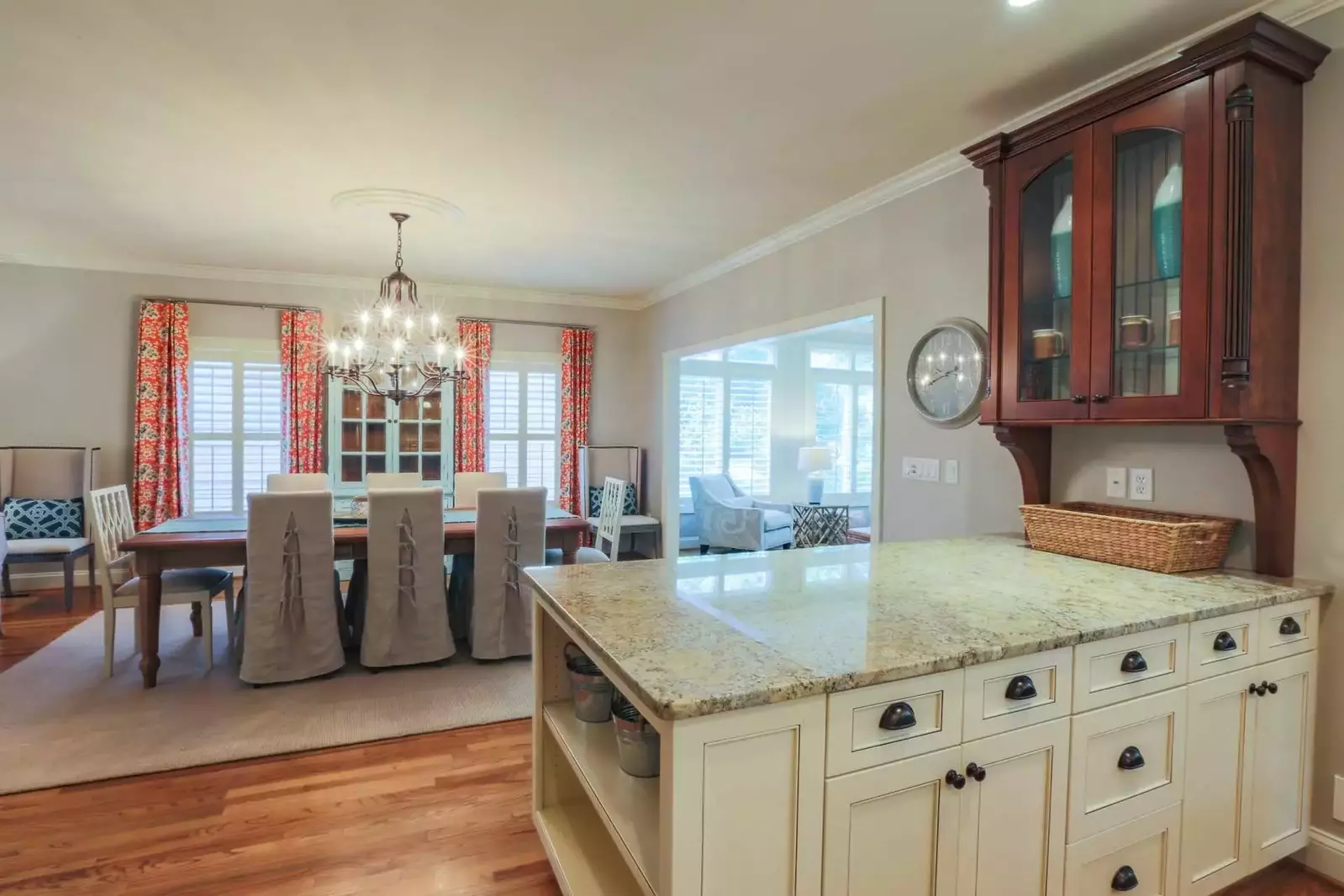 The dining room opens into the kitchen and the family room.