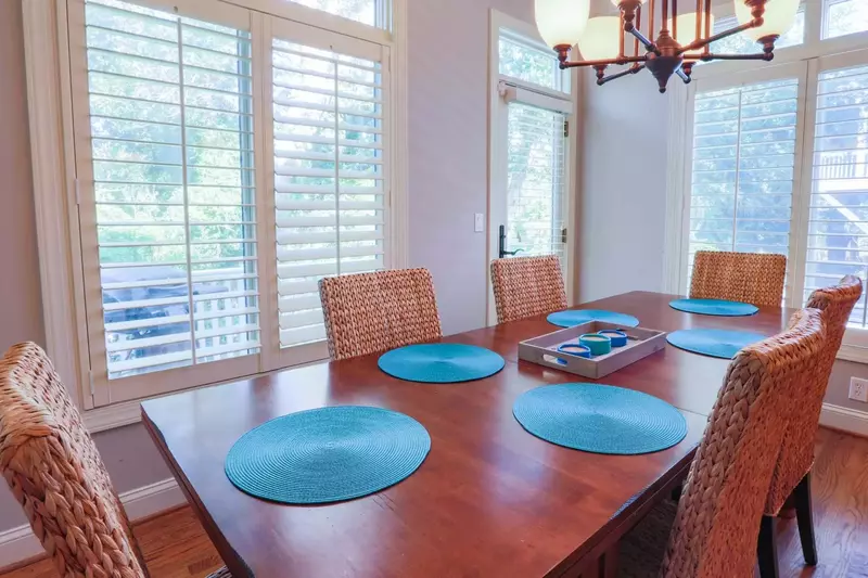 The dining table in the kitchen seats 6 people.