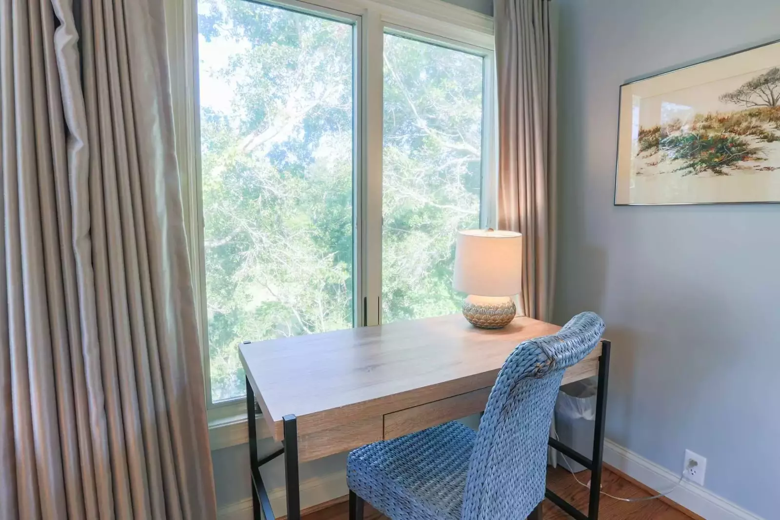There is also a small desk near the seating area in the master suite.