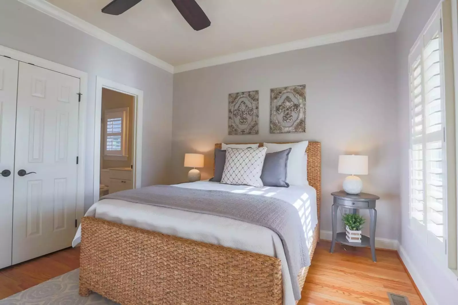 This guest bedroom also features an en suite bathroom.